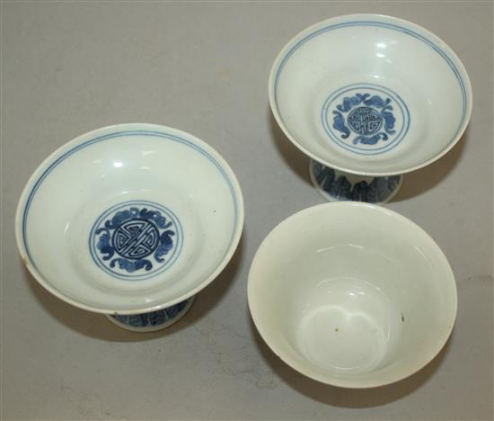 A pair of Chinese blue and white stem bowls, and a further bowl, late 19th / early 20th century, 9.5cm